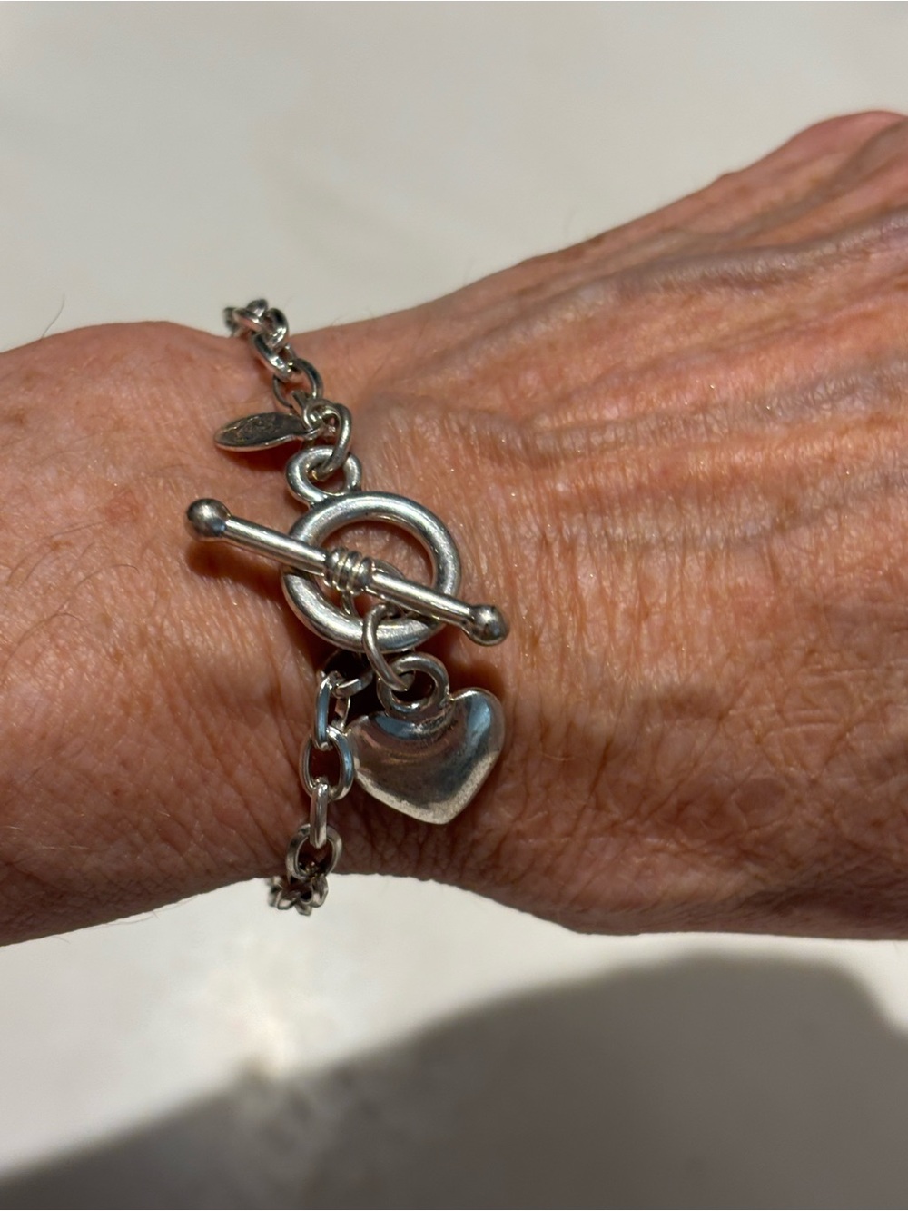 Silver Tone Puffed Heart Toggle Bracelet